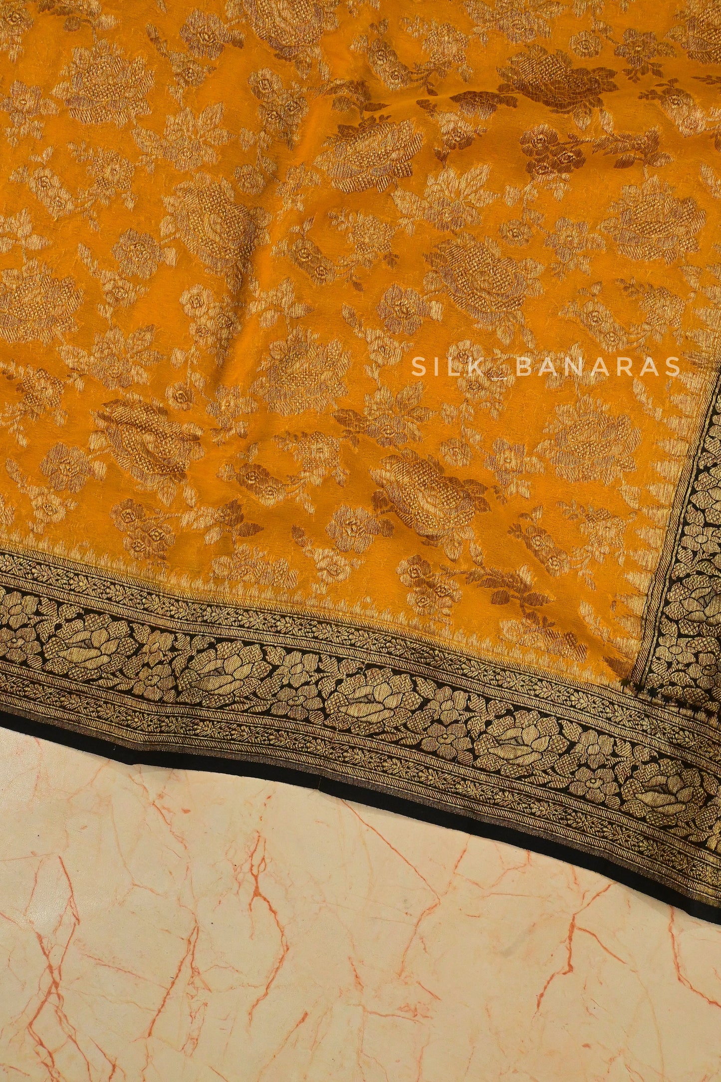 Dual shade floral antique zari saree