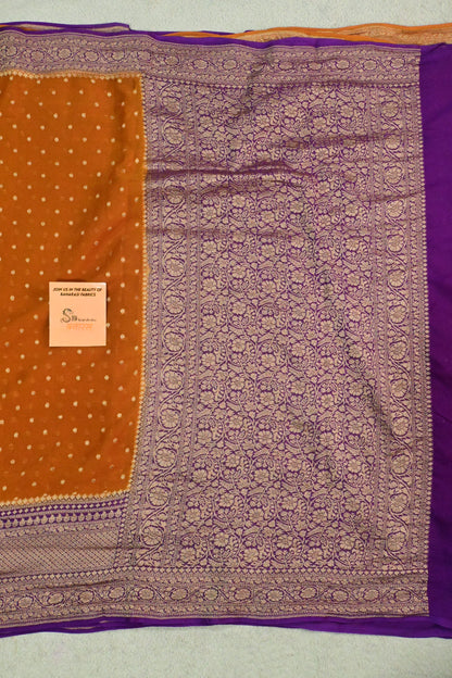 Rust & Royal Purple Handloom Khaddi Georgette Saree with Antique Zari weaving