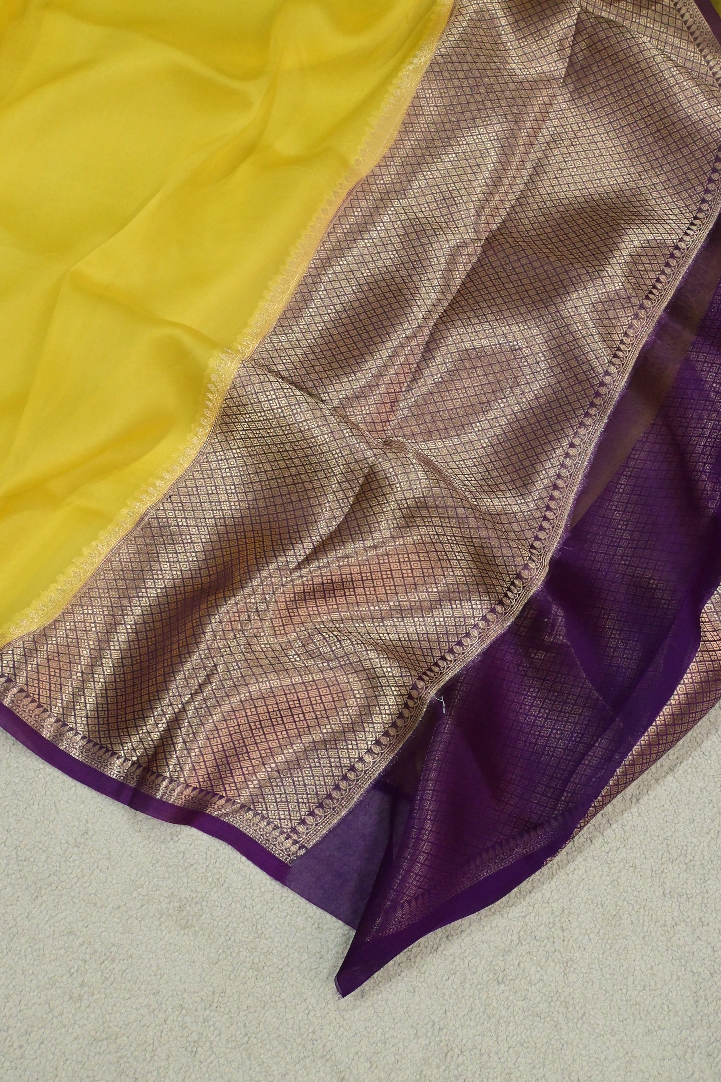 Handwoven pure Kora organza saree in contrast yellow with purple edge