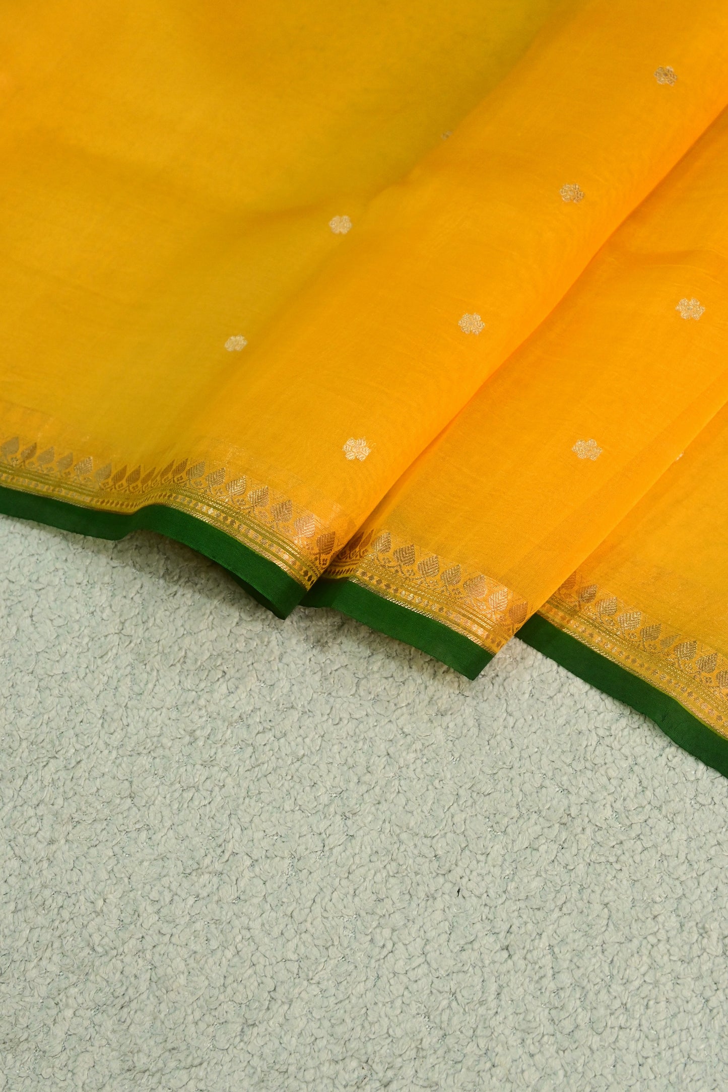 Classic yellow Kora Organza with a touch of emerald green.