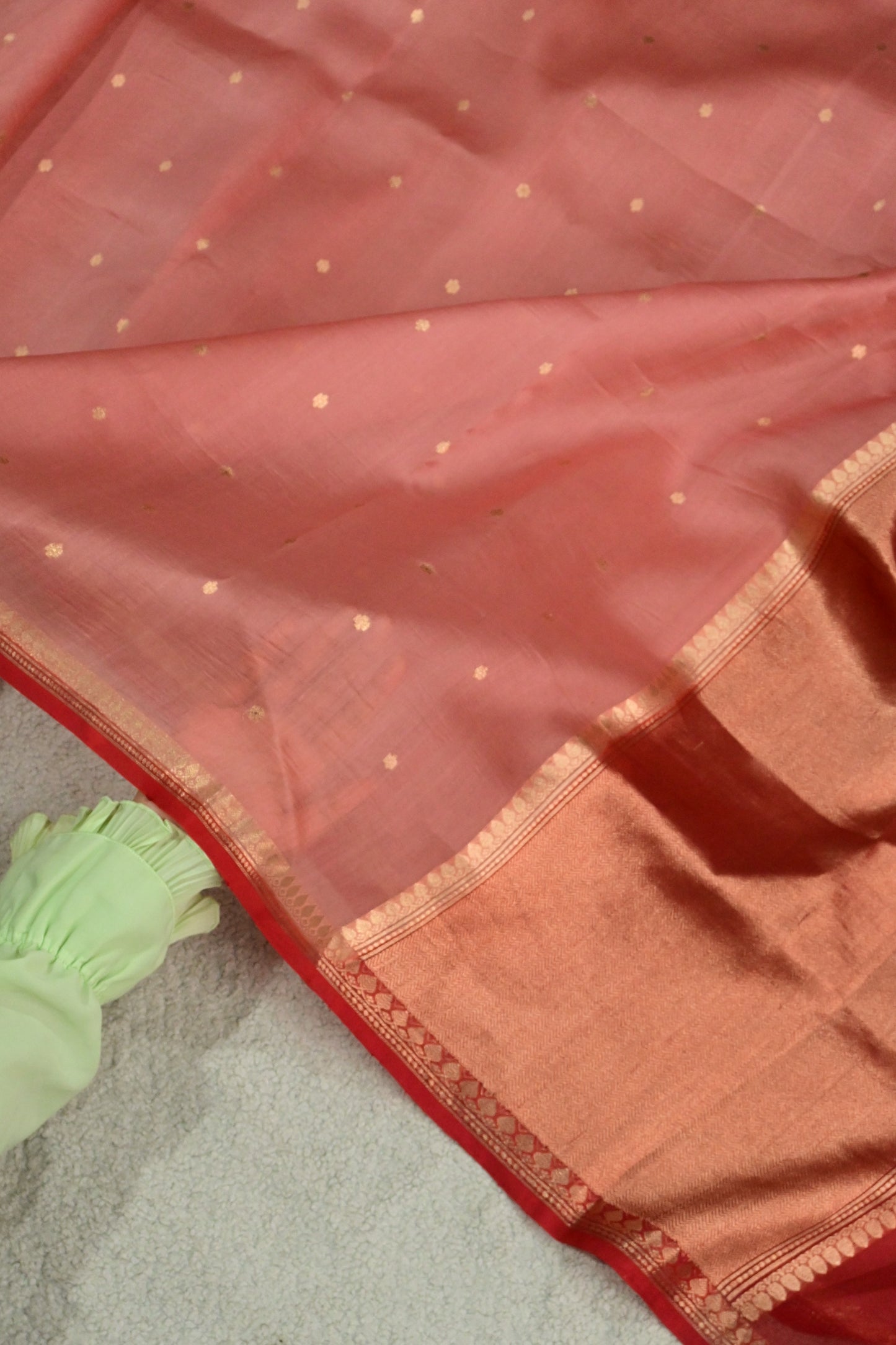 Classic handwoven pure Kora organza saree, having beautiful contrast red salvage