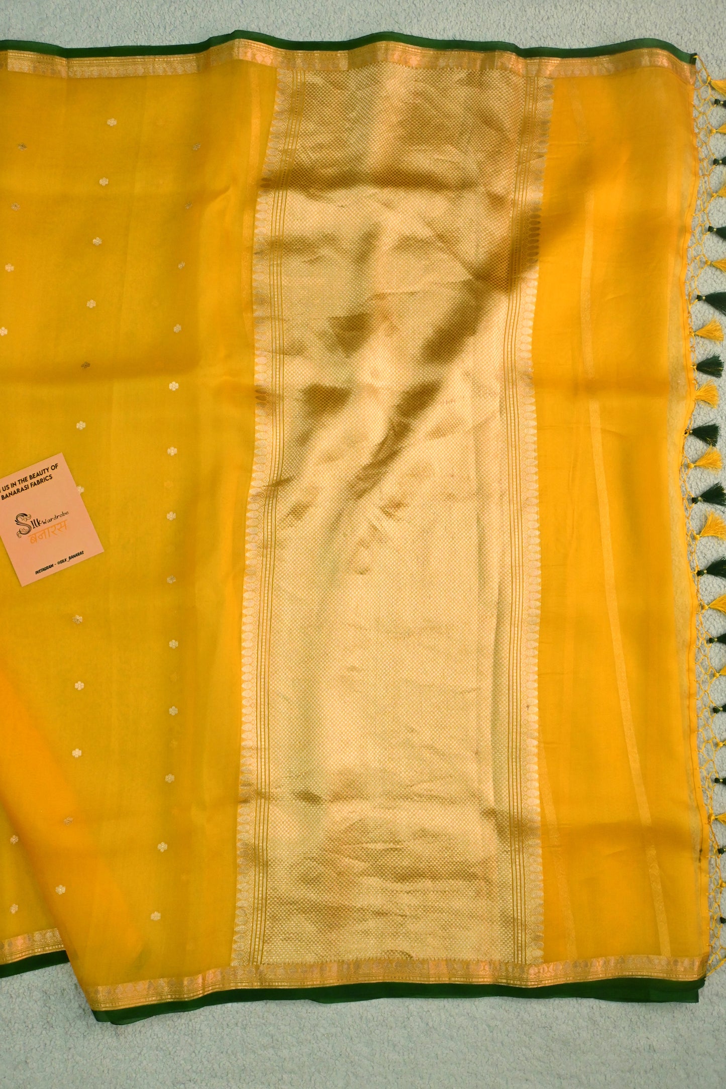 Classic yellow Kora Organza with a touch of emerald green.