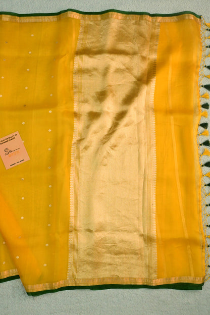 Classic yellow Kora Organza with a touch of emerald green.