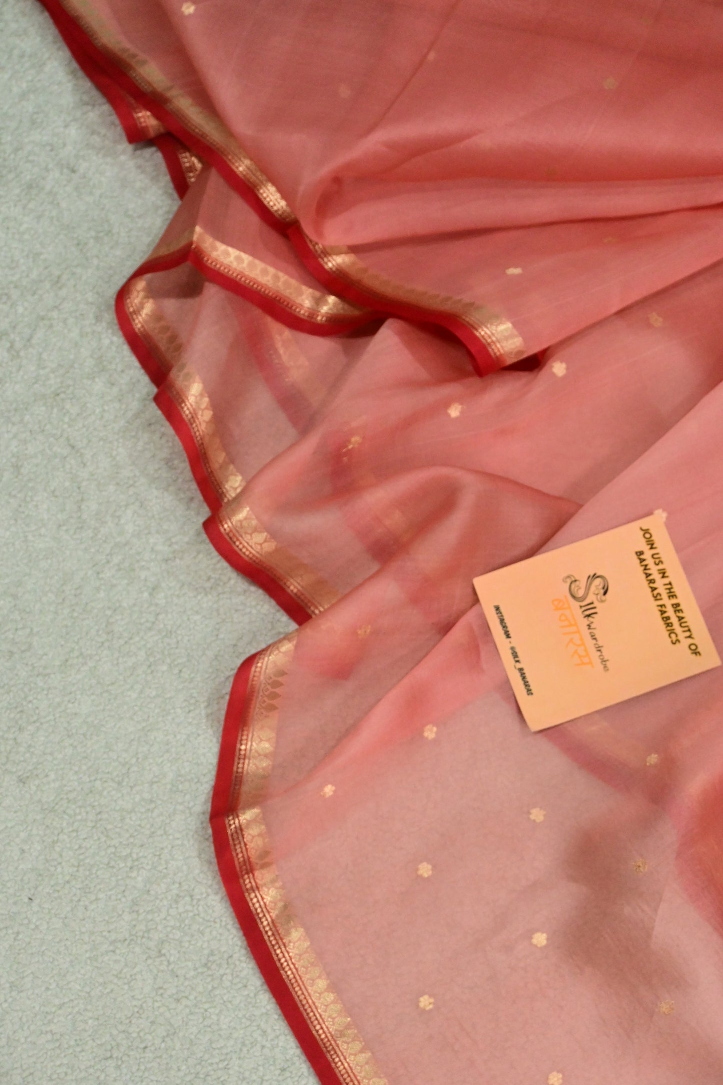 Classic handwoven pure Kora organza saree, having beautiful contrast red salvage