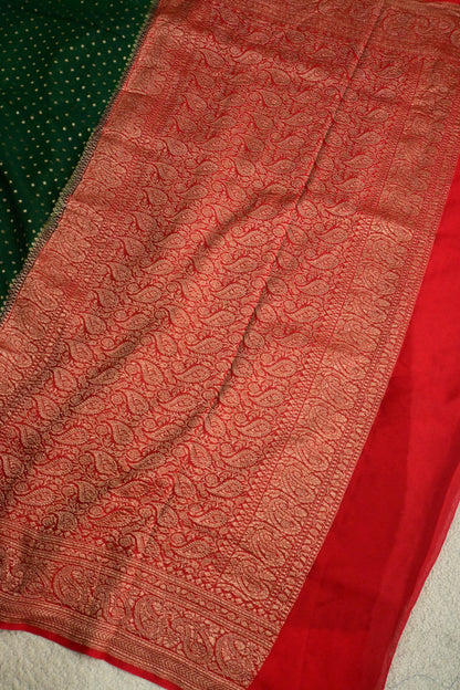 Emerald Green Pure Khaddi Georgette Saree with Antique Zari Konia & Paisley