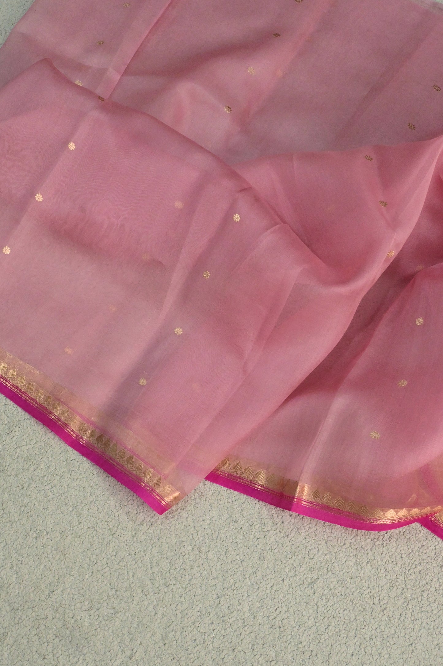 A lightweight pastel kora organza woven with timeless zari details.