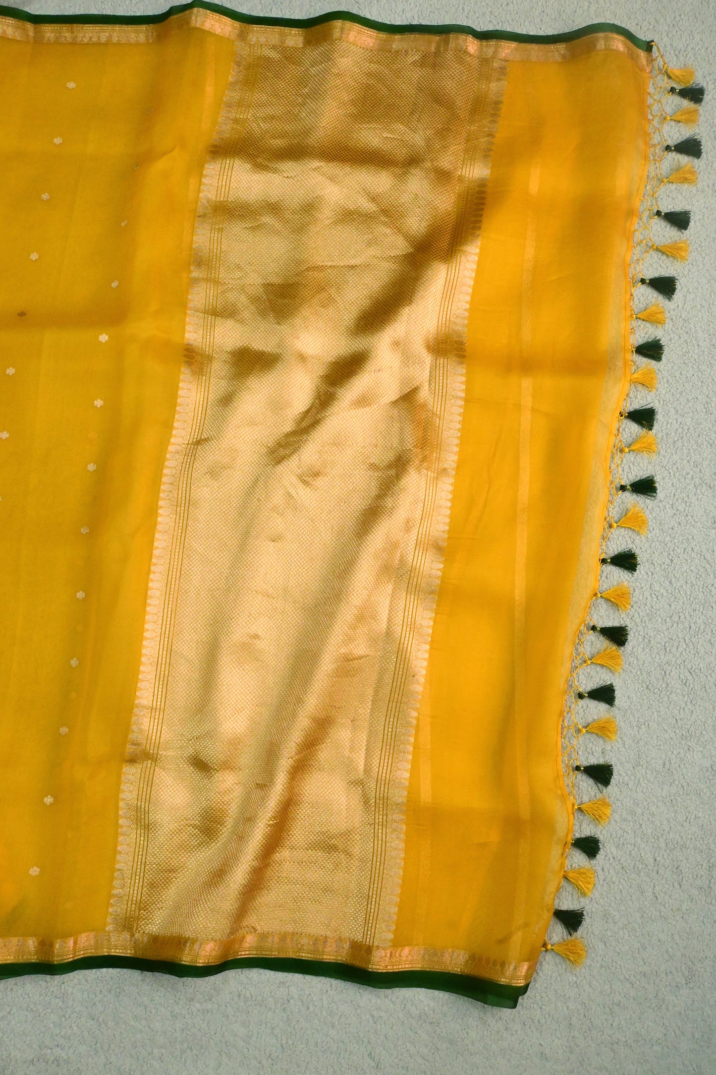 Classic yellow Kora Organza with a touch of emerald green.