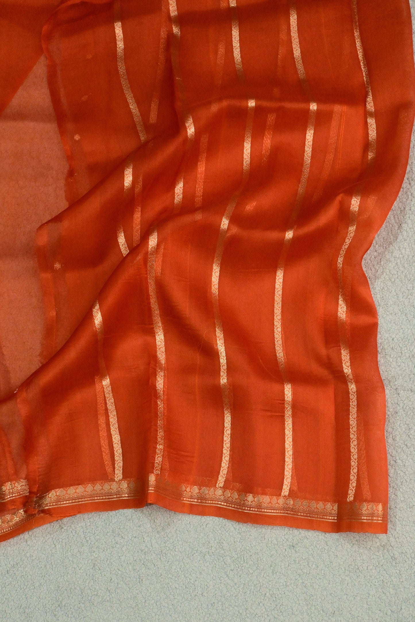 Beautiful rust orange handwoven Kora Silk Saree