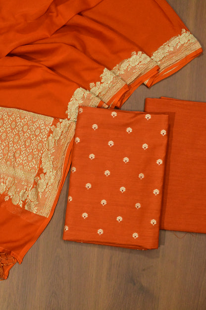 Rust Orange Handwoven Pure Khaddi Georgette Banarasi Suit Set with Gold Zari