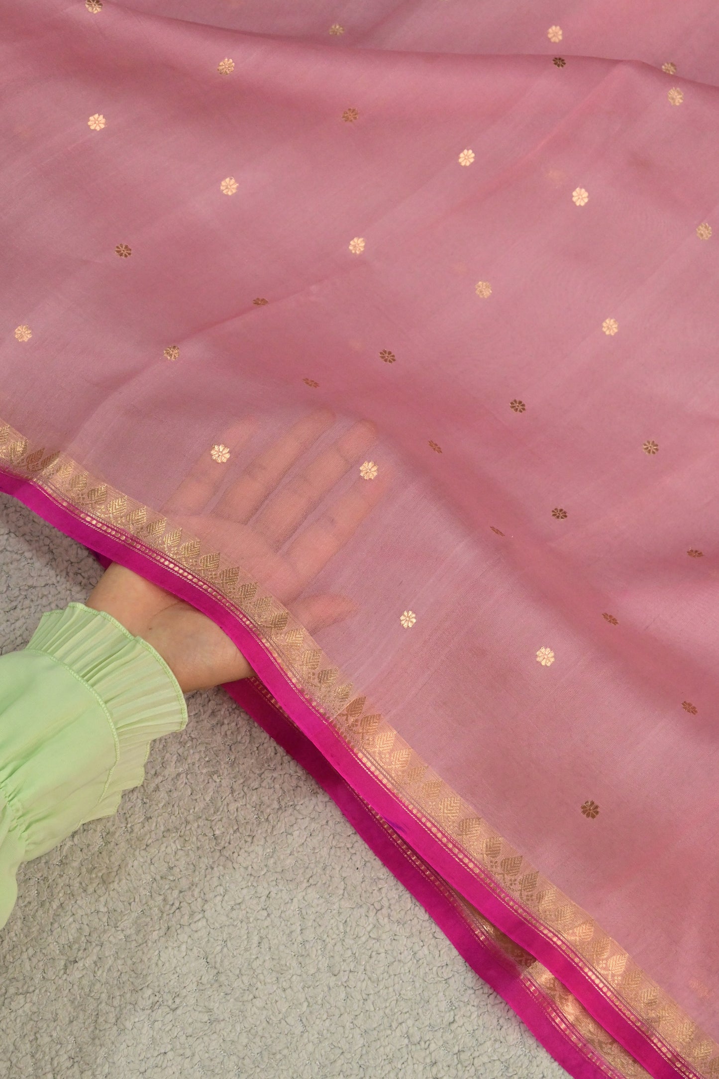 A lightweight pastel kora organza woven with timeless zari details.