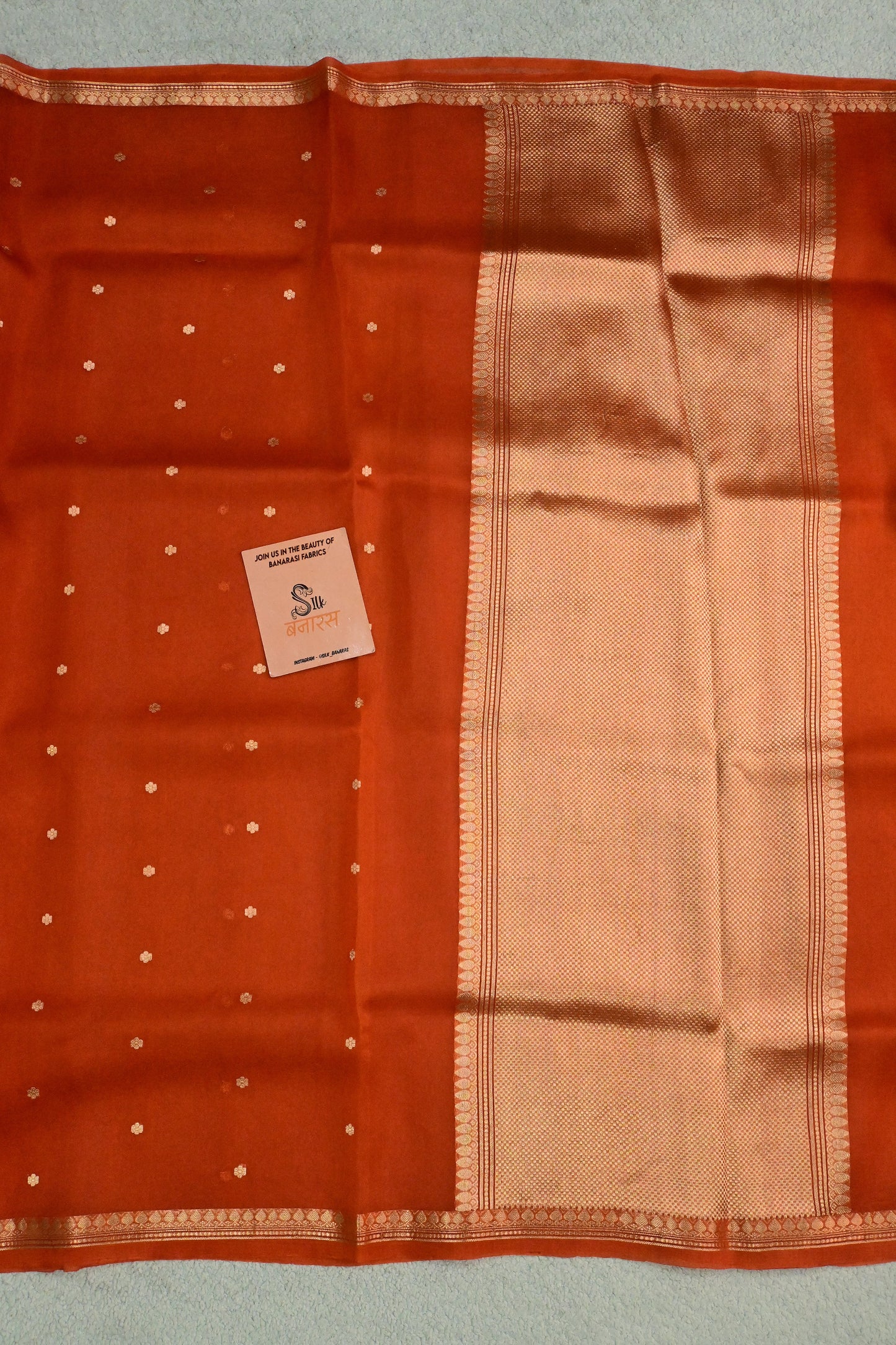 Beautiful rust orange handwoven Kora Silk Saree