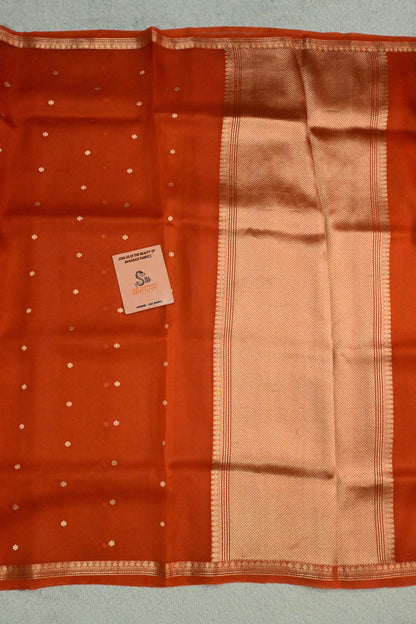 Beautiful rust orange handwoven Kora Silk Saree