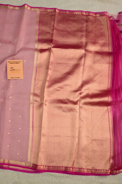 A lightweight pastel kora organza woven with timeless zari details.