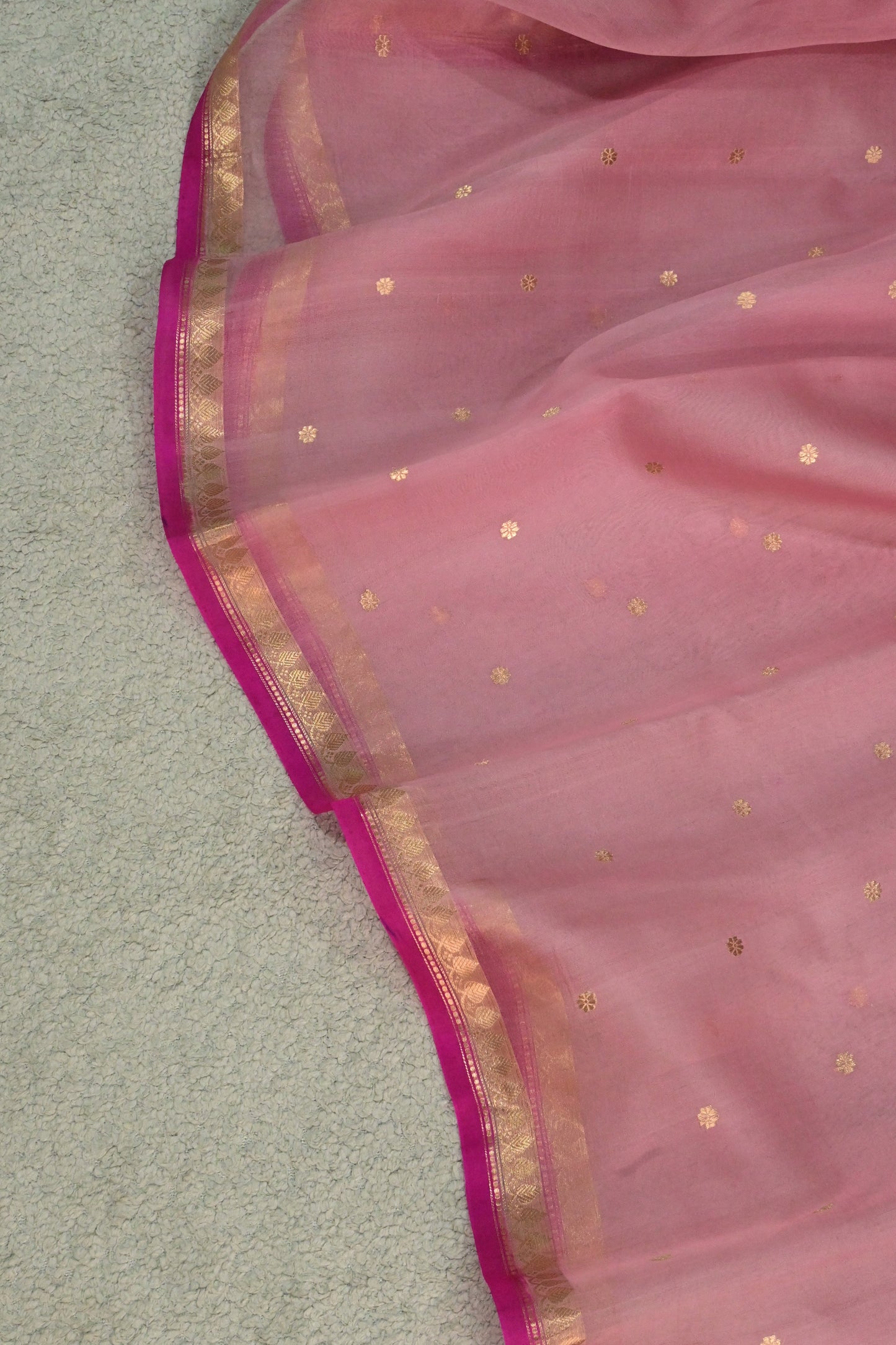 A lightweight pastel kora organza woven with timeless zari details.