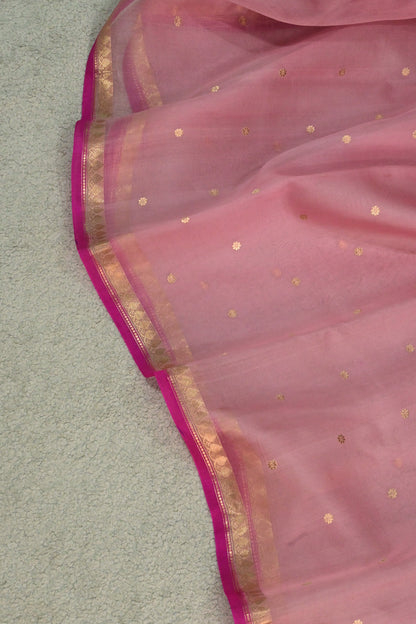 A lightweight pastel kora organza woven with timeless zari details.
