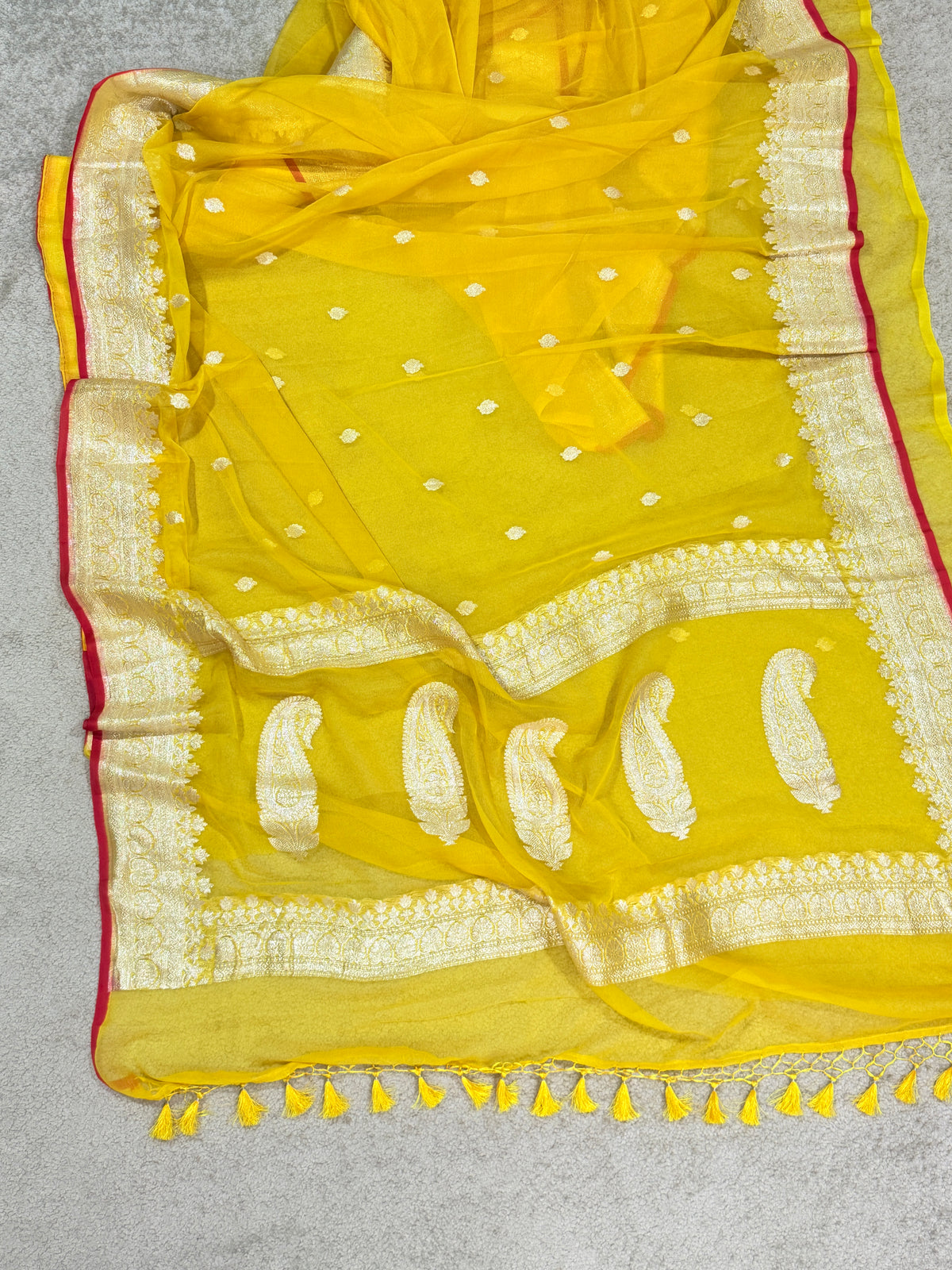 Handwoven Pure Khaddi Chiffon Banarasi Saree in Bright Yellow with Silver Zari & Contrast Red Piping