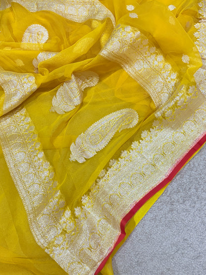 Handwoven Pure Khaddi Chiffon Banarasi Saree in Bright Yellow with Silver Zari & Contrast Red Piping