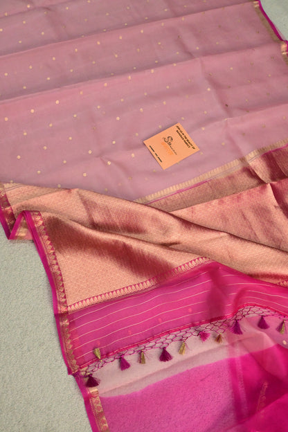 A lightweight pastel kora organza woven with timeless zari details.