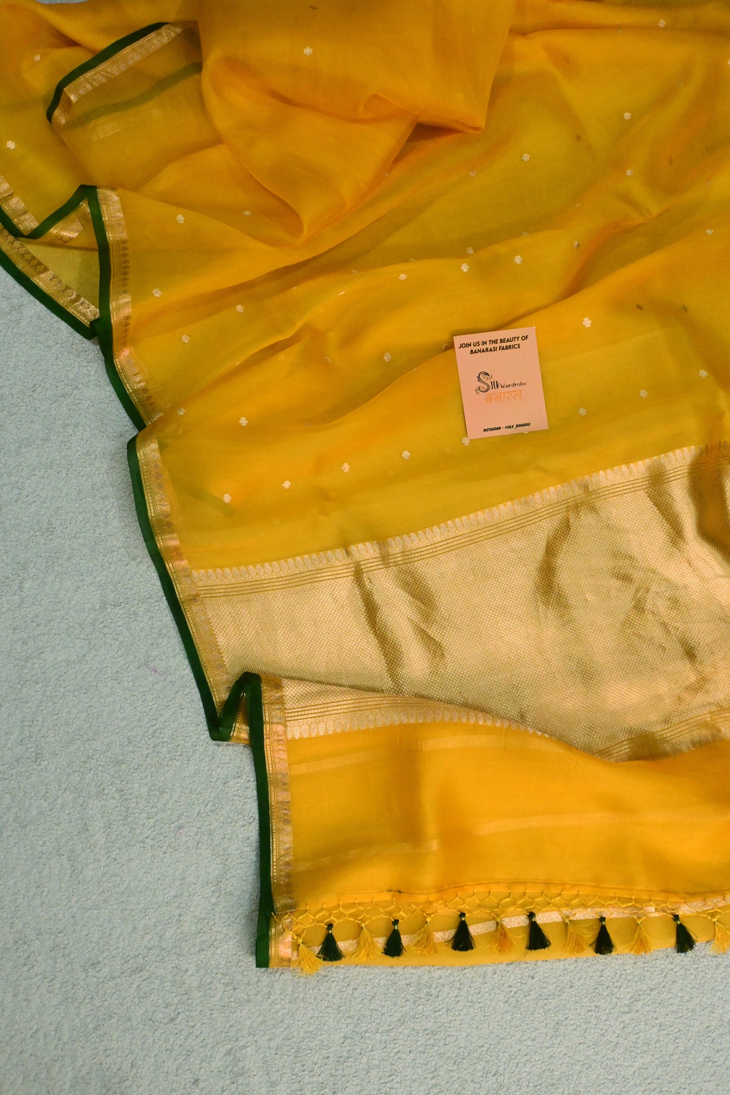 Classic yellow Kora Organza with a touch of emerald green.