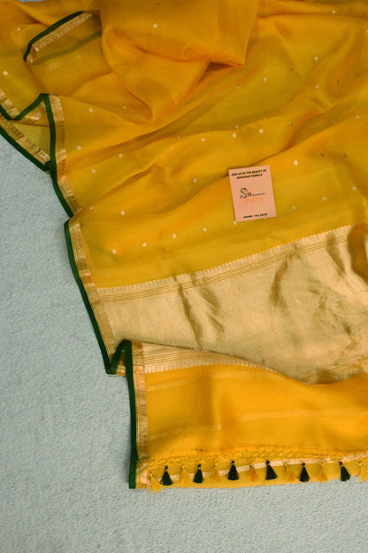 Classic yellow Kora Organza with a touch of emerald green.