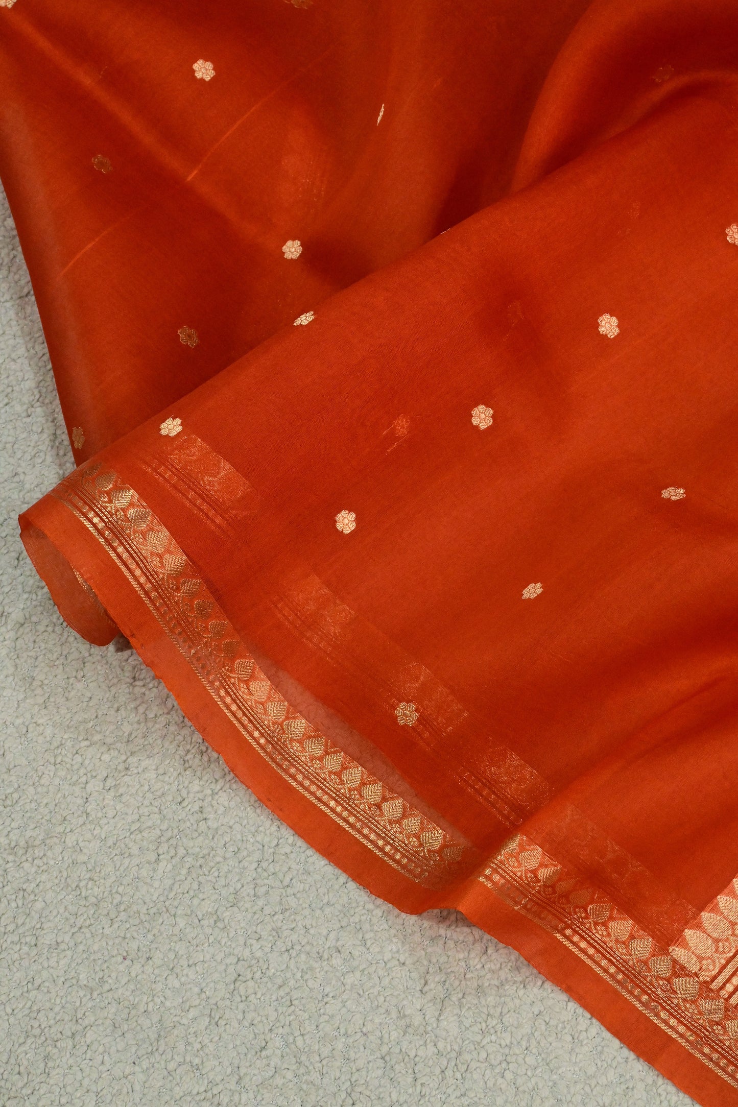 Beautiful rust orange handwoven Kora Silk Saree