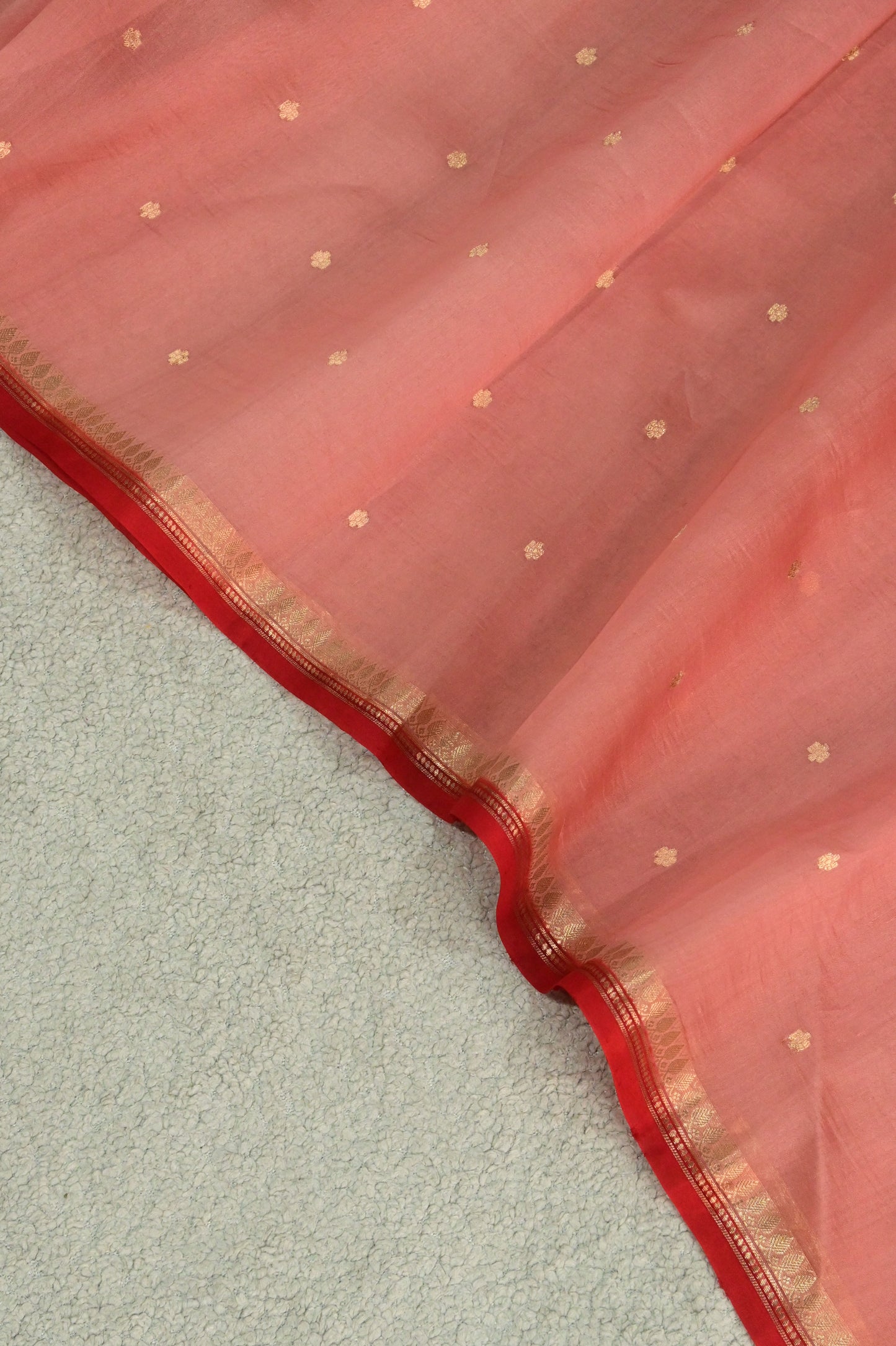Classic handwoven pure Kora organza saree, having beautiful contrast red salvage