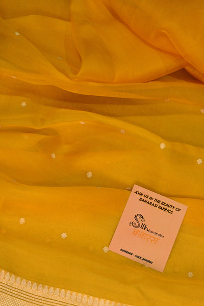 Classic yellow Kora Organza with a touch of emerald green.