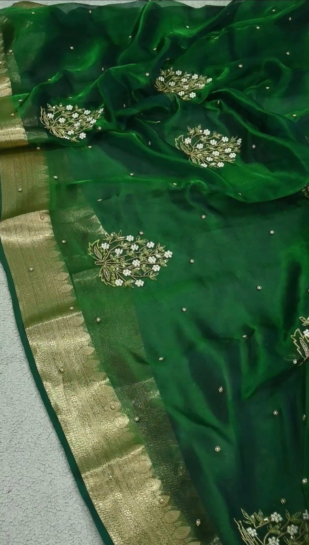 Beautiful green handwoven pure tissue silk zardozi saree