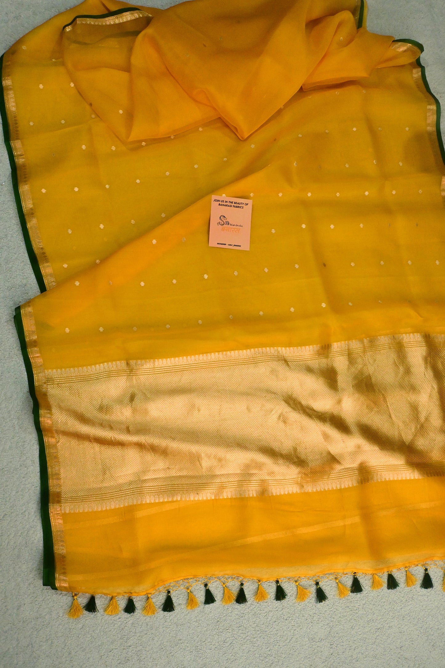 Classic yellow Kora Organza with a touch of emerald green.